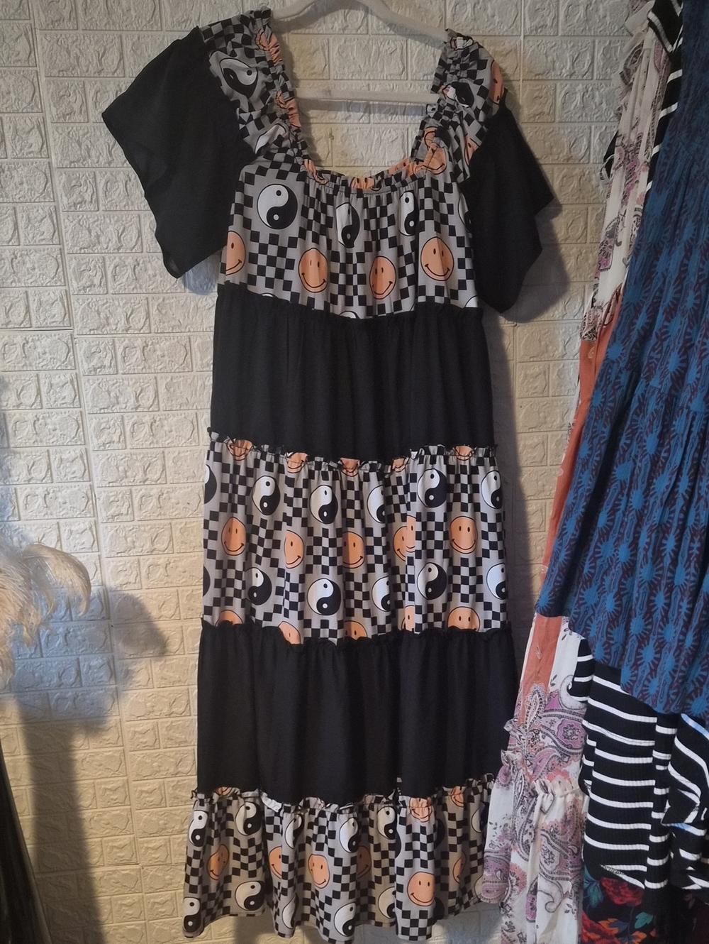 Dressed in LALA Black Tiered Maxi Dress with Peach Smile & Yin-Yang Print